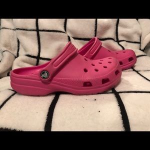 Pink crocs